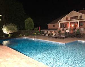 LED Floodlight in backyard pool area
